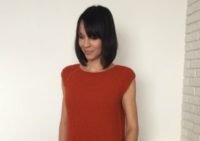 Вязаная туника спицами с карманами